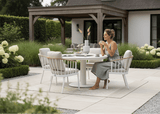 Apple Bee Condor Dining Tuinset Ø140cm 5-delig in Oyster kleur op terras