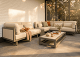 Sfeerbeeld van de Apple Bee Santorini Upholstered hoekloungeset op het terras