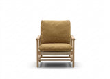 Apple Bee Jamila loungestoel teak en wicker met Amber kussen, sfeerbeeld